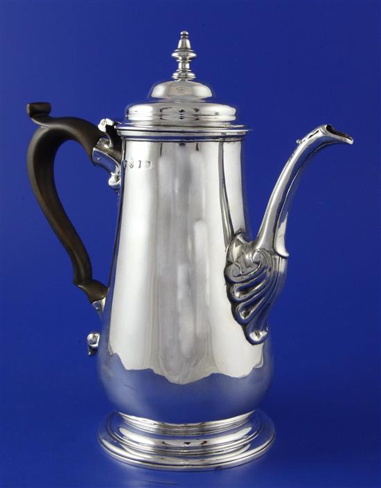 A George II silver coffee pot, gross 26 oz.